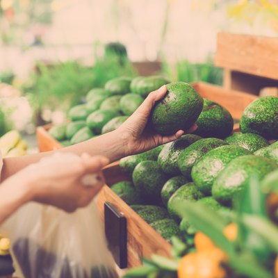 Buying avocados in store