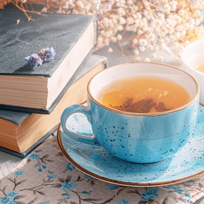 warm tea and a book in the sunshine