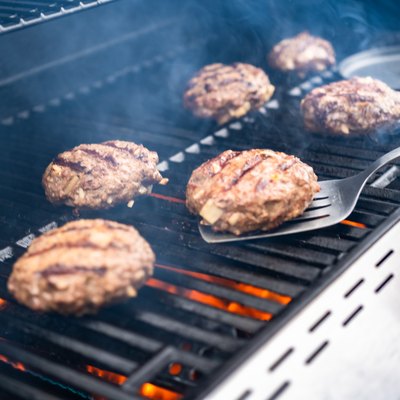 how to grill burgers cooking hamburger beef patties on a gas grill.