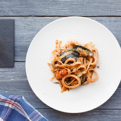Traditional italian seafood pasta with calamari and mussel