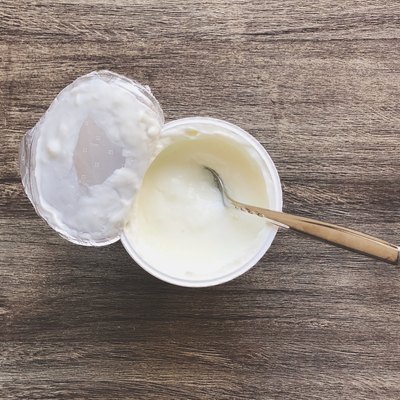 Directly Above Shot Of Yogurt In Container On Table