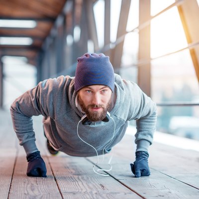 Man doing push-ups outside