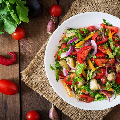 Salad baked eggplant and fresh tomatoes