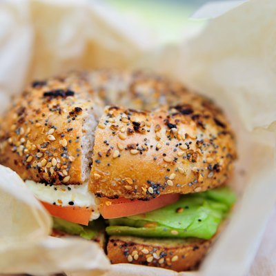 Healthy bagel with lettuce, cheese and tomato