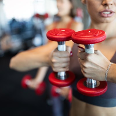 Beautiful fit women working out in gym