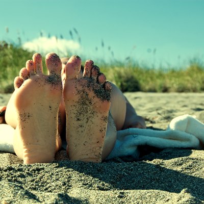Bottom of feet on Blowing Rocks Beach