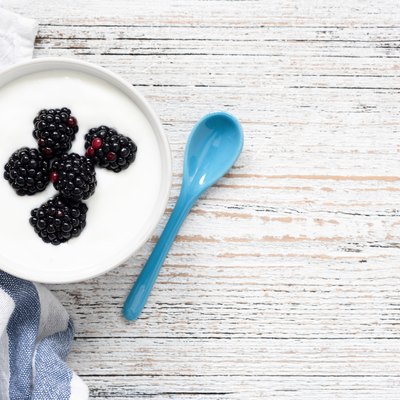 Yogurt with berries in bowl