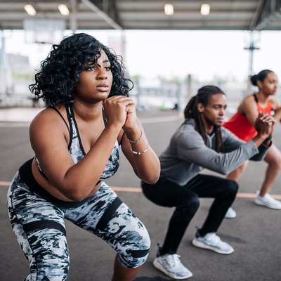 Obese woman on private session with female instructor
