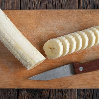 Ripe bananas and a sliced