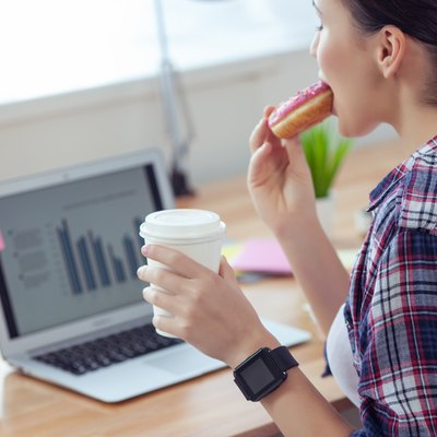female worker is snacking in office