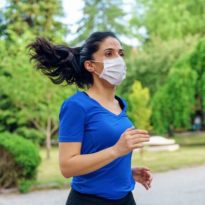 girl running with mask