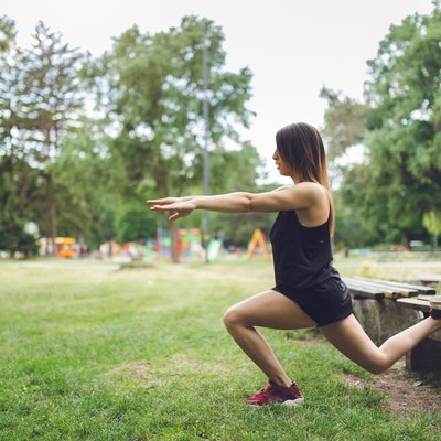Woman exercising in a public park
