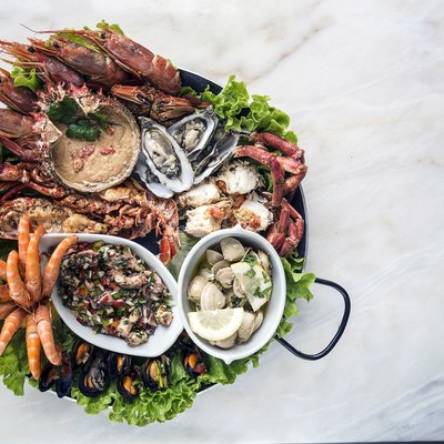 mixed fresh portuguese seafood selection gourmet set platter meal on table