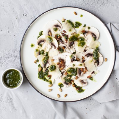 Mushroom carpaccio with basil pesto and parmesan