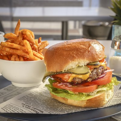 Big cheeseburger with fries