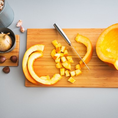 Pumpkin on cutting board. Closeup
