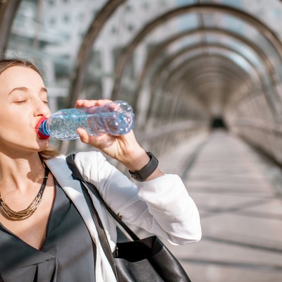 Business woman with water at the business center