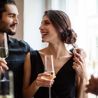 Couple holding champagne flutes
