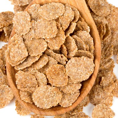 pile of bran flakes isolated on white