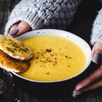 Carrot pumpkin cream soup with garlic bread