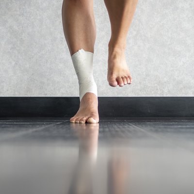 Athlete balancing to regain proprioception on sprained ankle