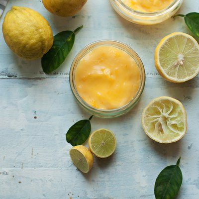Lemon With Fresh Lemon In Background