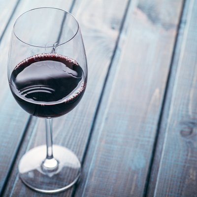 Red wine on blue wood