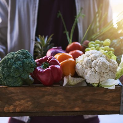 Fruit and vegetables in wooden box