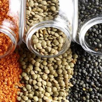 Lentils spilling from glass jars