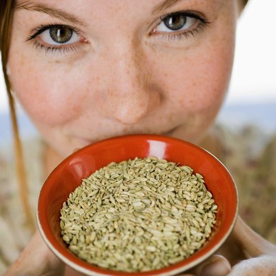 Woman with bowl of seeds