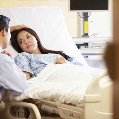 Husband Visiting Wife In Hospital
