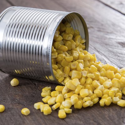 Corn on wooden background