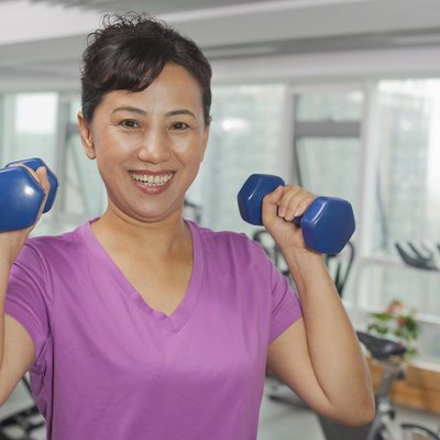 Woman exercising with weights