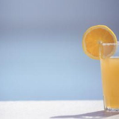 Orange juice, an orange slice, garnish