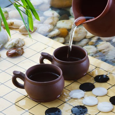 "Tea set and weiqi,close-up"