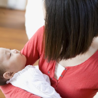 Mother Holding Baby Girl