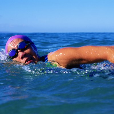 Woman swimming in ocean or lake