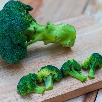 Fresh broccoli on wooden background,broccoli wooden table