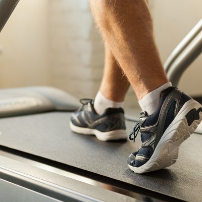 Exercising on treadmill.