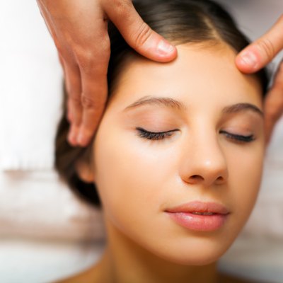 Beautiful woman having an head massage