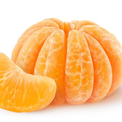 Peeled tangerine isolated on white