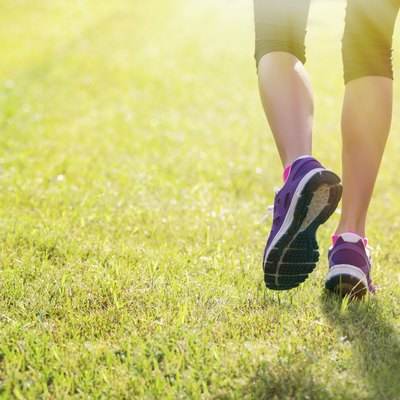 Woman running outdoors in morning