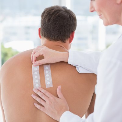 Doctor doing skin test to her patient
