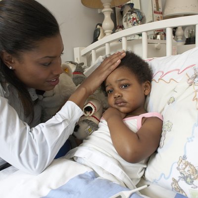 Mother checking temperature of daughter (21-24 months)
