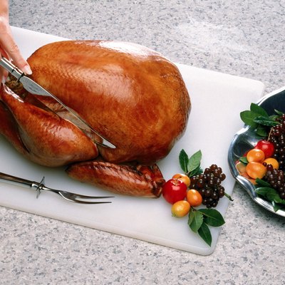 Person carving turkey