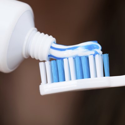 Adding Toothpaste On Brush
