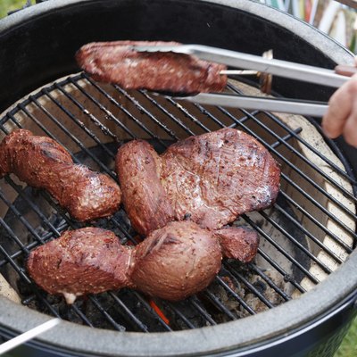 Venison being fried on grill