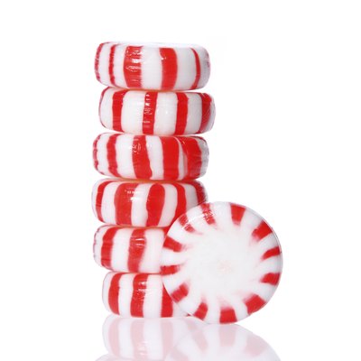 Peppermint candy tower isolated, macro.