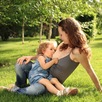 Cute child breastfeeding