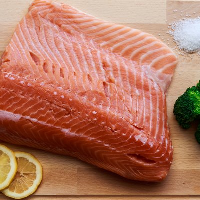 Raw salmon with broccoli, lemon and salt.
